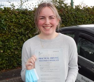 Mia passed her driving test first time